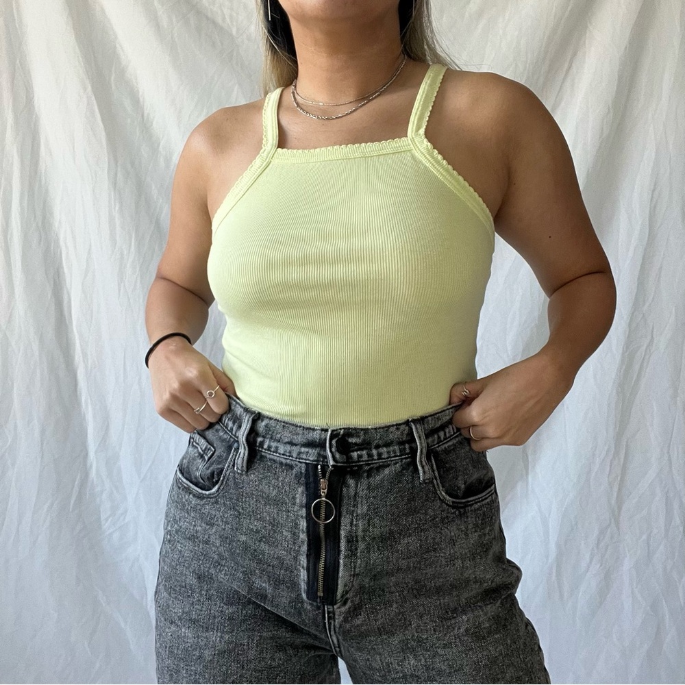 Bright yellow bodysuit